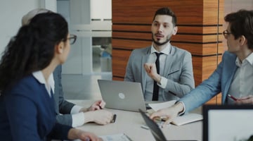 Business team discussing reports and dashboards